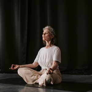 Focused shot of hands in a mudra position