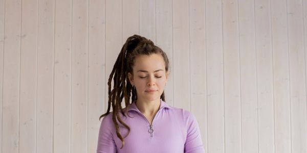 Minimalist room with a single yoga mat and sunlight